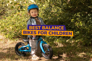 child on a balance bike - bike club