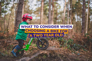 child on balance bike - bike club