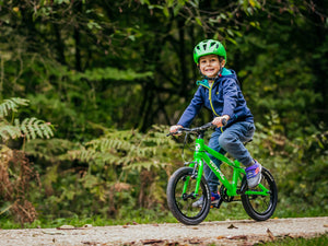 boy riding a green forme bike - bike club