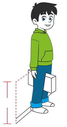 Child stood against a wall